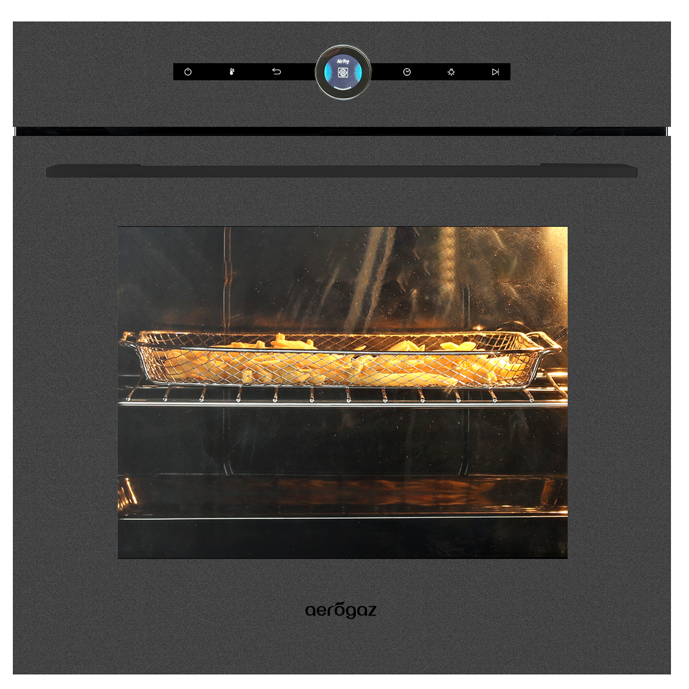 French fries roasting in a metal basket inside an oven, warm light glowing on the fries.