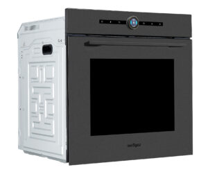 Built-in dark-front electric oven with a round control dial and horizontal control strip at the top, mounted in a kitchen cabinet.